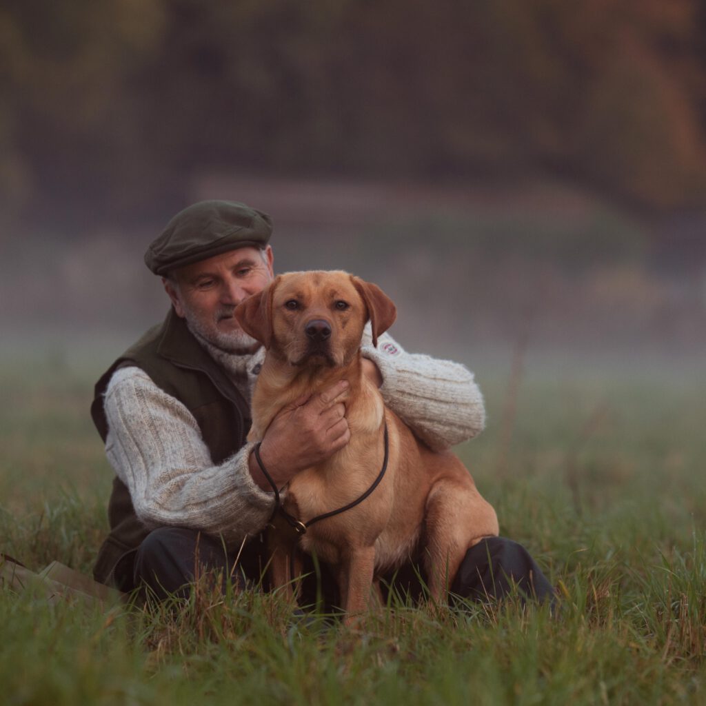 Lifestyle_Image-26_Old_Man_and_Labrador_sitting_by_sunset_Square_Face_and_Instagram